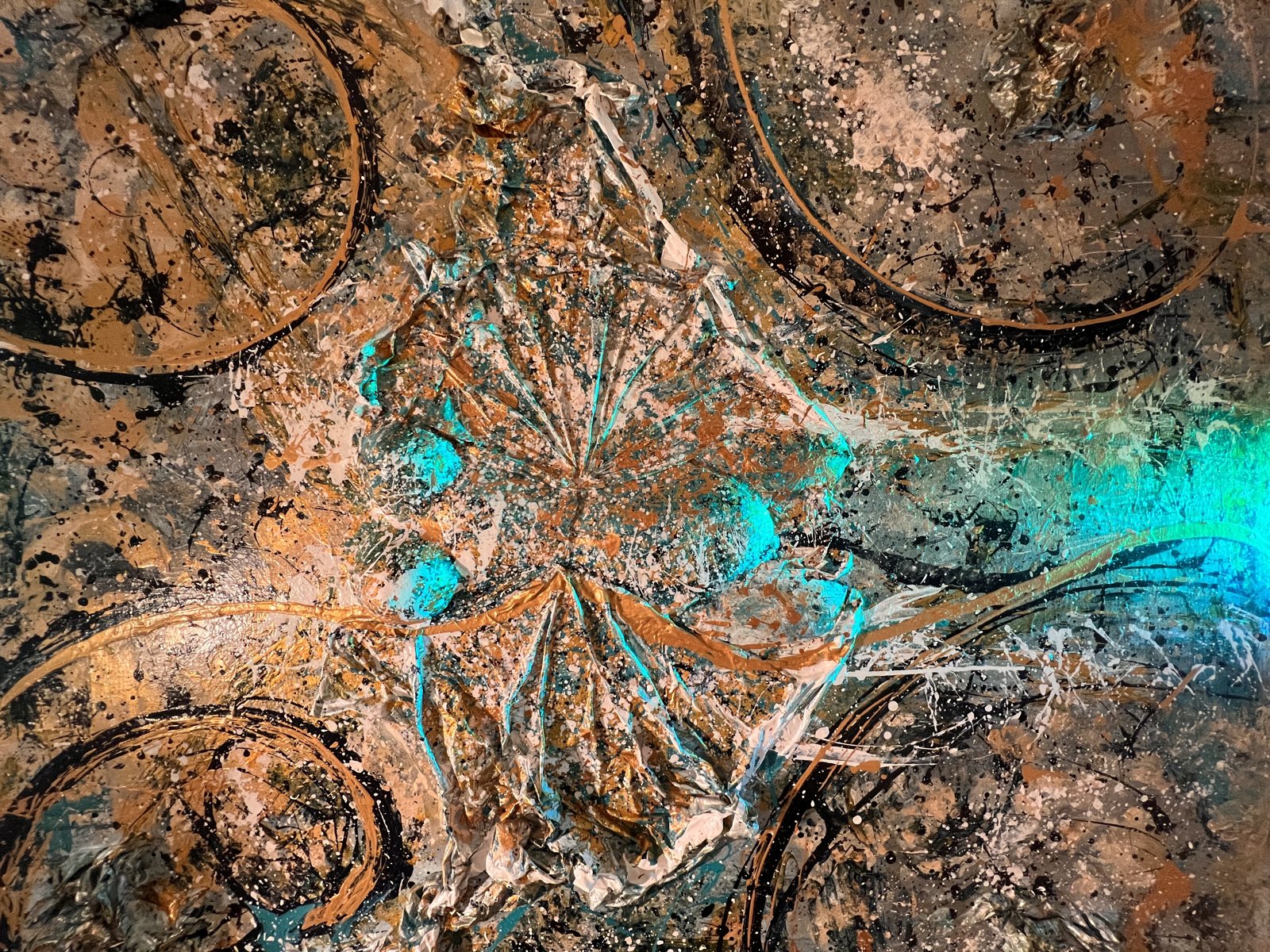 A close detail of a Polen Cerci surface, gold and pigment worked into the weave